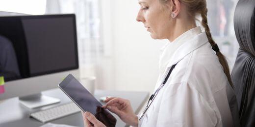 medical professional using an eu mdr checklist on their tablet
