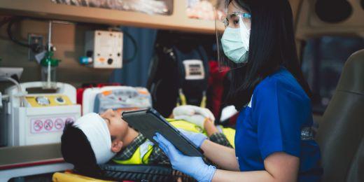 employees acting out an emergency as part of a training activity for world first aid day