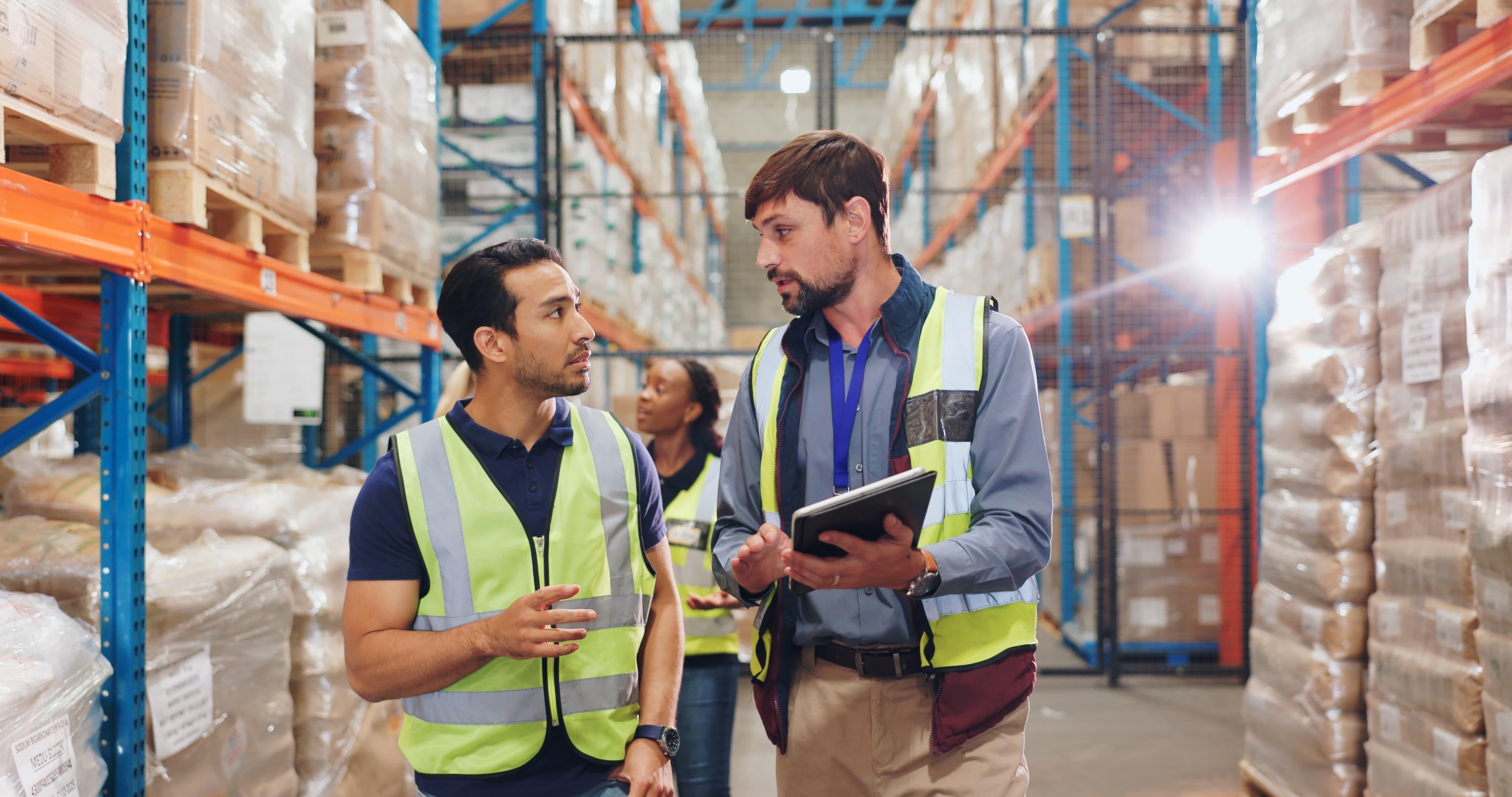 Two store managers doing inspections using retail compliance software