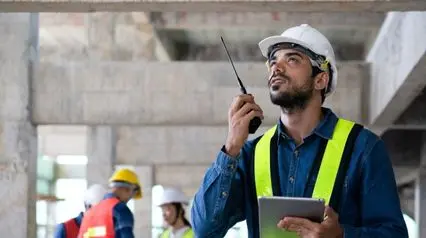 a construction supervisor inspecting a facility using a facility checklist|Facility Checklist Sample Report|Facility Checklist|Facility Checklist Template