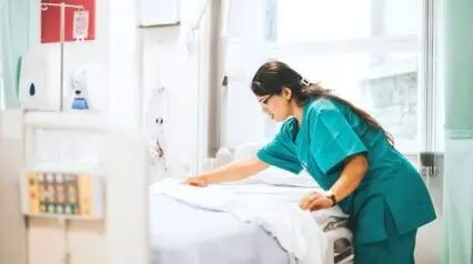 attendant performing hospital housekeeping