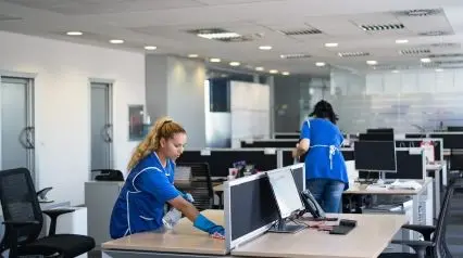 two workers cleaning an office following tasks listed on an office cleaning checklist|https://safetyculture.com/wp-content/media/2023/07/Office-Cleaning-Checklist-Sample-Report-SafetyCulture.pdf|Office Cleaning Checklist Sample Report