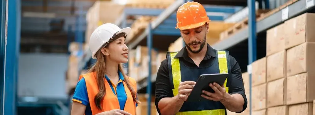 two QHSE professionals using a QHSE app on tablet|two QHSE professionals using a QHSE app on tablet|ComplianceQuest QHSE App|Ideagen QHSE App|Mango QHSE App|OSOS QHSE App|Qooling QHSE App|Safenergy Systems QHSE App