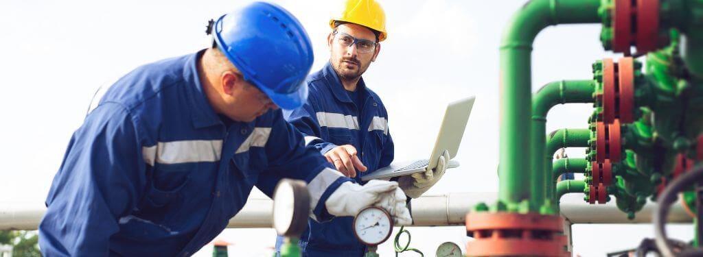 men using a chemical manufacturing software while conducting maintenance|Aptean Process Manufacturing Chemical Manufacturing Software|BatchMaster Chemical Manufacturing Software|Sphera Chemical Manufacturing Software|LabWare Chemical Manufacturing Software|ChemInventory Chemical Manufacturing Software