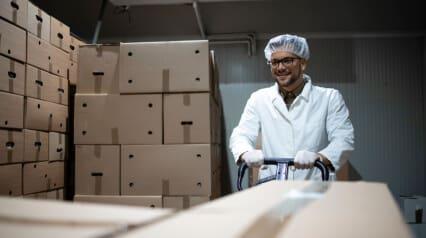 Employee ensuring compliance with cold chain management plan
