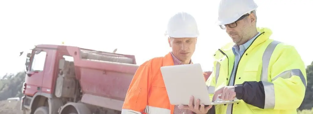 two men at work using an equipment tracking software|Workiz|AI Field Management|EZOfficeInventory|FieldEZ