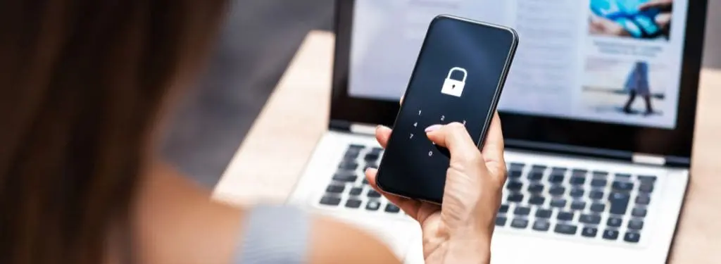 a locked smartphone held by a woman to ensure gdpr compliance|Crownpeak GDPR Compliance Software|HIPAA One GDPR Compliance Software|OneTrust|Perimeter 81 GDPR Compliance Software|Risk Cloud by LogicGate GDPR Compliance Software|TrustArc GDPR Compliance Software