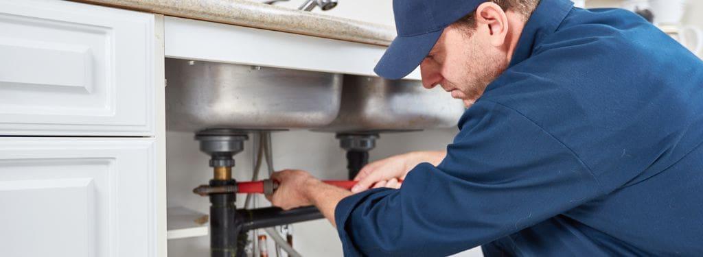 a plumber carrying out plumbing work as assigned using a plumbing software|FieldEdge Plumbing Software|Housecall Pro Plumbing Software|Jobber Plumbing Software|Service Fusion Plumbing Software|ServiceTitan Plumbing Software|simPRO Plumbing Software