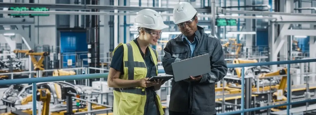 two quality engineers checking insights on manufacturing processes using a PPAP software on a tablet and a laptop|ComplianceQuest PPAP Software|EHS Insight PPAP Software|ProShop ERP PPAP Software|QIMAone PPAP Software|QT9 QMS PPAP Software|Qualtrax PPAP Software