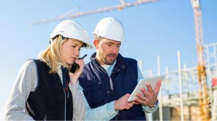 construction managers discuss risk transference methods in the field