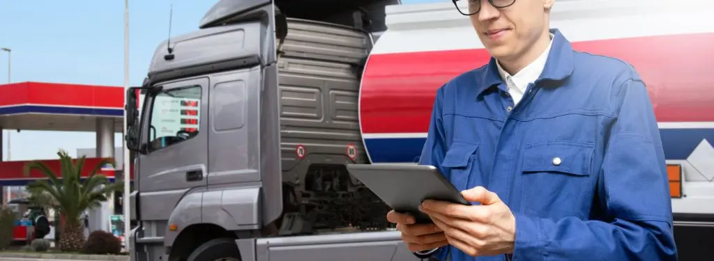 driver using a dvir app on their tablet before operating their truck