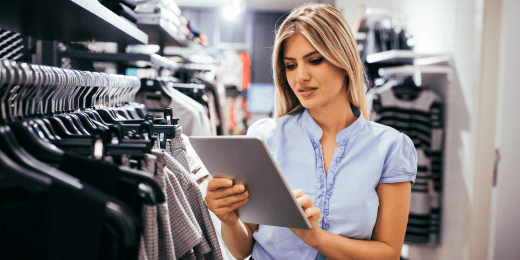 A shopkeeper following the proper retail store management with the help of technology
