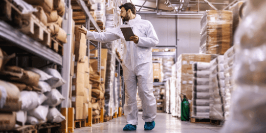 An inspector ensuring the compliance with the dry food storage guidelines