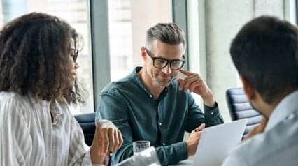 a management team conducting a management review