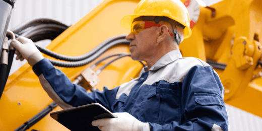 An engineer doing a asset criticality assessment on his tablet.