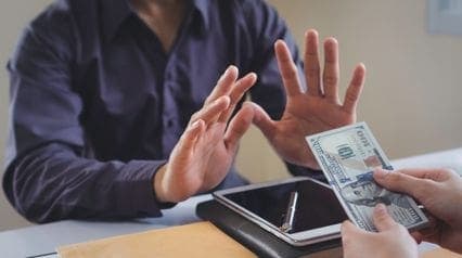 a professional practicing anti-bribery in accordance with the ISO 37001 standard