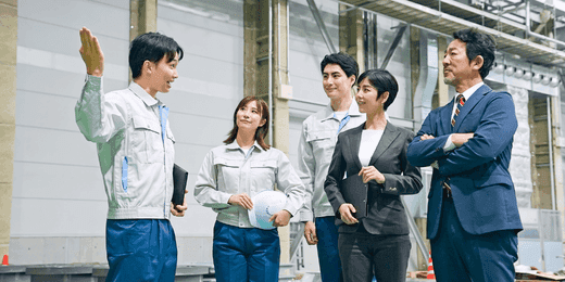 Staff conducting a visitor induction onsite