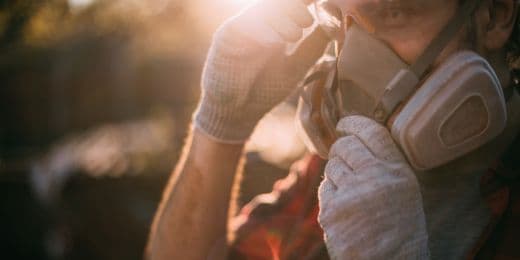 person using respiratory protection ppe at work