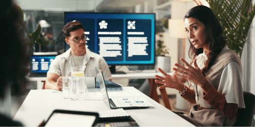 Work team discussing business metrics