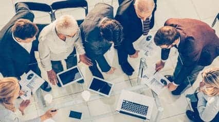 workmates brainstorming in a meeting abou