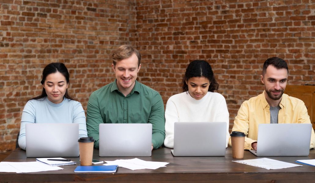 Employees in a company streamlining their audits with AI assistants