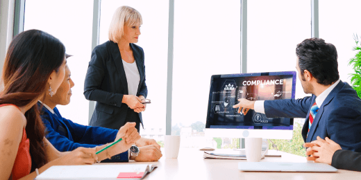 A team assessing the organization's standing on the compliance maturity model