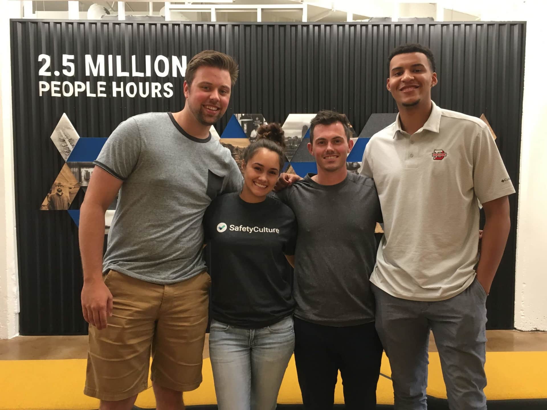 Miles, posing with KC's first class of interns in the summer of 2019