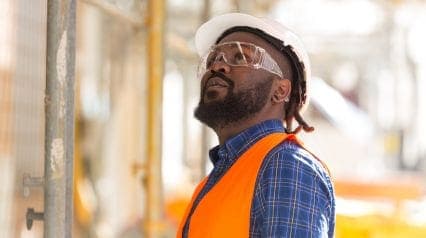 a construction worker wearing face protection equipment at worrk