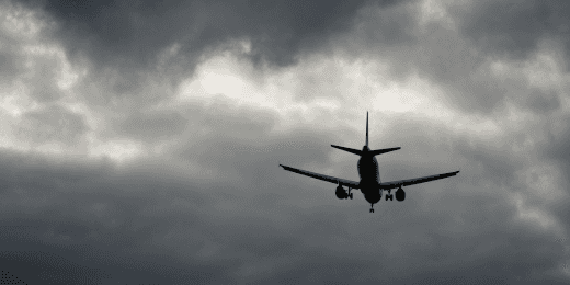 A plane flying in bad weather.