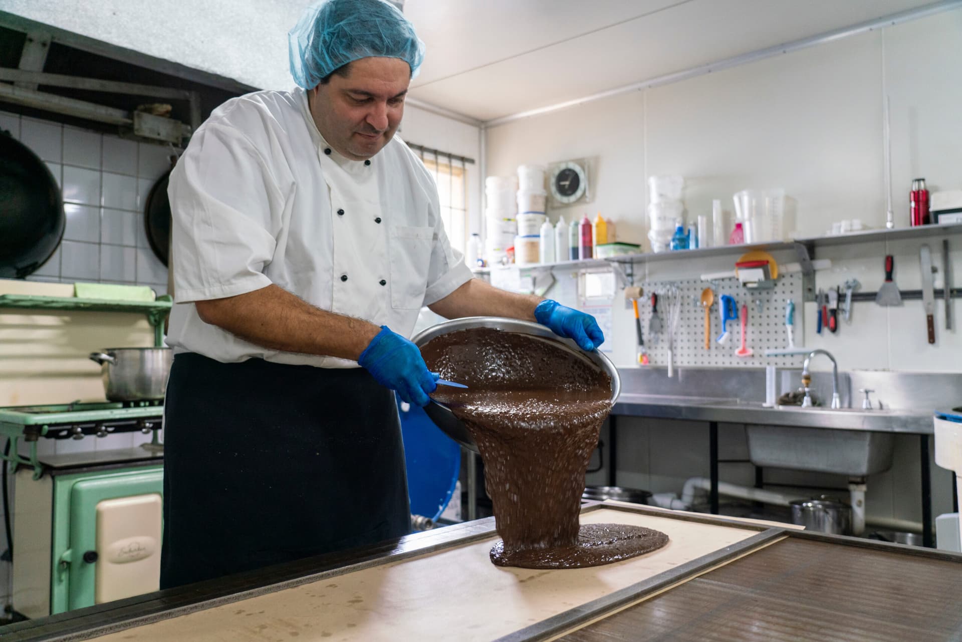 Man pouring chocolate at Davies Chocolates