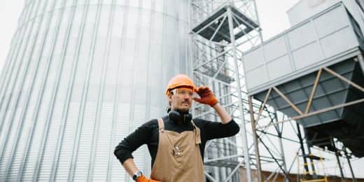 farm worker celebrating stand up 4 grain safety week on the field