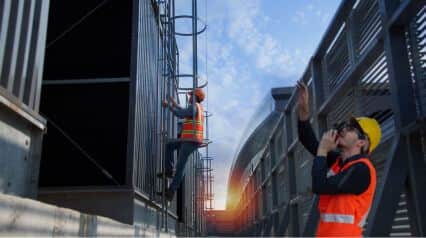 workers conducting ladder safety training sessions