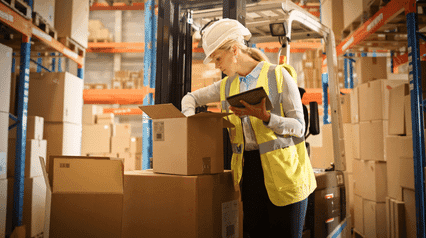 product inspector checking packages for shipment