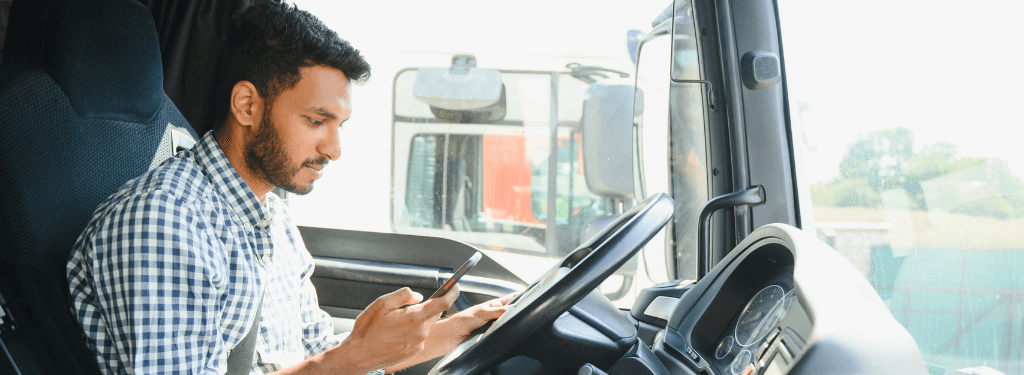 A driver clocking in for work using an electronic work diary