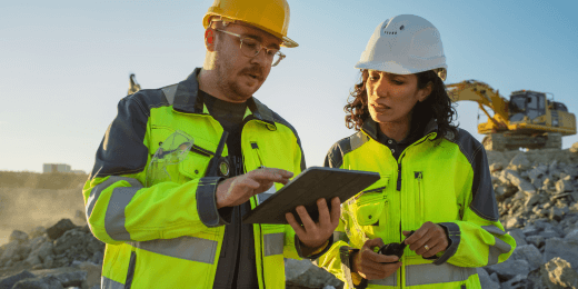 Officers ensuring safety competency in a construction site