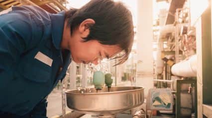 an employee using an emergency eyewash station that was previously inspected for safety using an emergency eye wash station checklist|Emergency Eye Wash Station Checklist Sample Report|Emergency Eye Wash Station Checklist