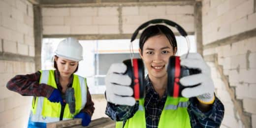 two employees conducting noise awareness training on site