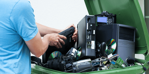 A manager following the proper equipment disposal guidelines