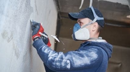 a technician restoring electrical wiring