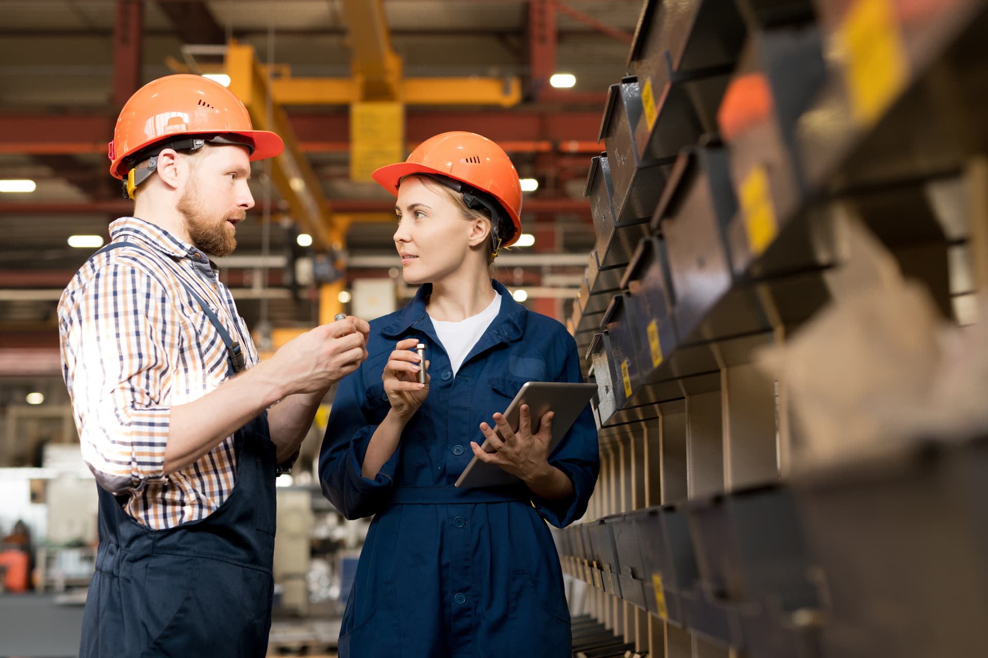two product quality engineers discussing ideas on open innovation for technical supplies