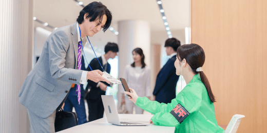 Woman welcoming a visitor