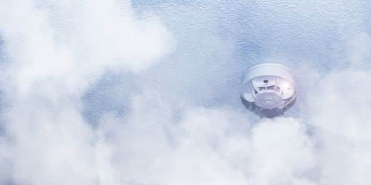 a smoke detector in use as part of a smoke control system in a building