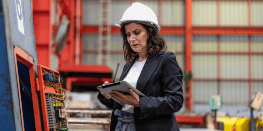 A engineer managing their maintenance backlog with a tablet.