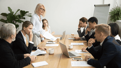 Employees discussing how to mitgate risk in the workplace