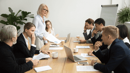 Employees discussing how to mitgate risk in the workplace