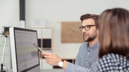 two professionals conducting process analysis