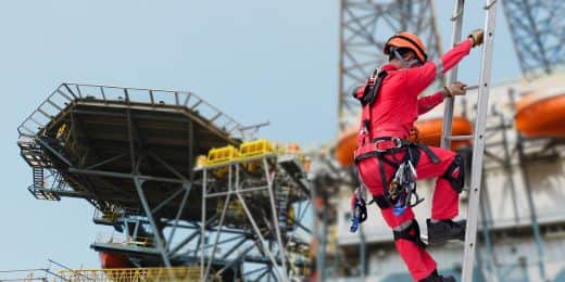 worker celebrating national ladder safety month
