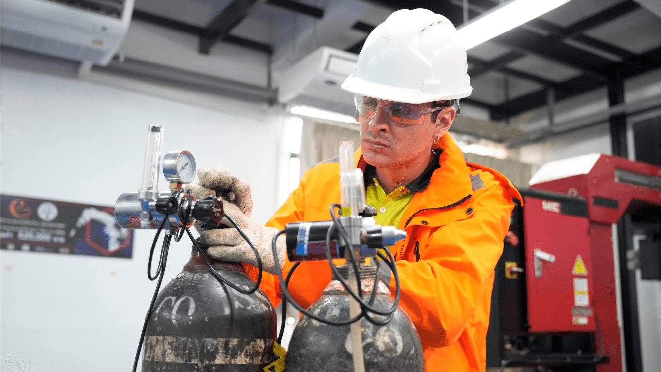An EHS officer is checking a gas leak emergency procedures template.