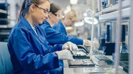 people in an assembly line