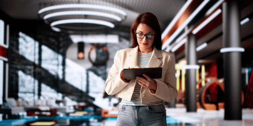 Woman in hotel looking at tablet